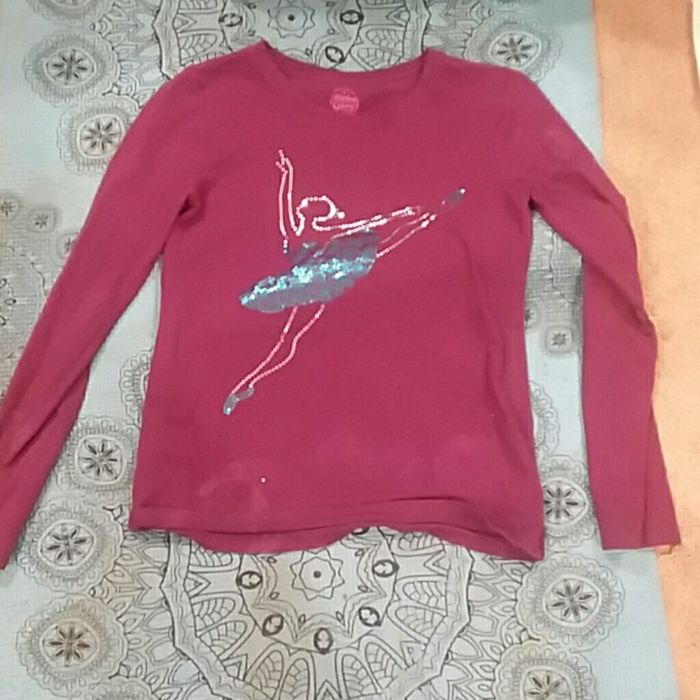 A kids long sleeved shirt